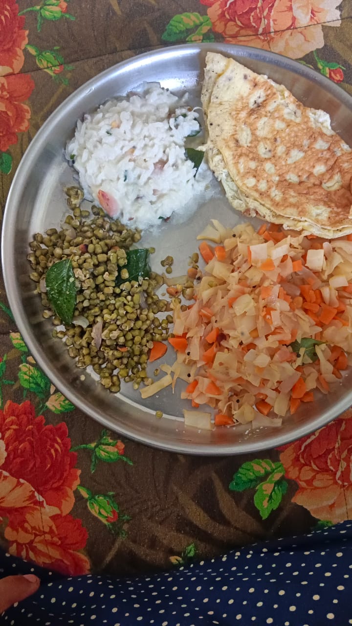 Another of Gowri's plates, with dal, vegetables, and a balanced carbohydrate portion