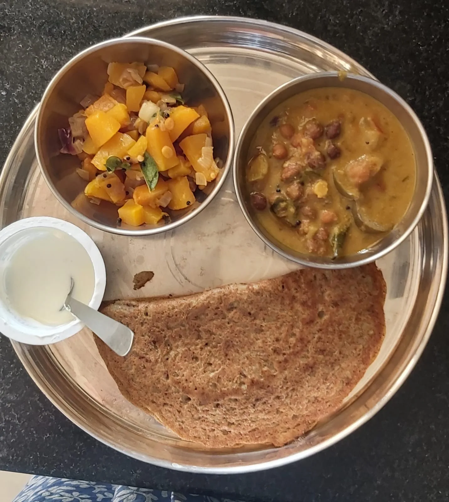 Swetha's lunch plate: dosa with vegetable kurma, kootu, curd and cucumber