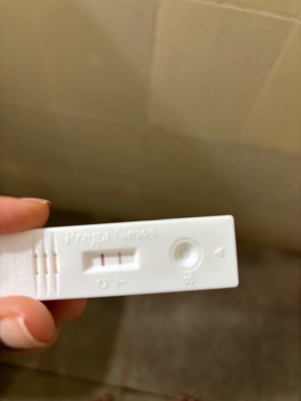 Prega News pregnancy test showing two lines, positive result
