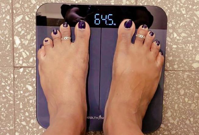 Weighing scale showing starting weight of 64.5 kg