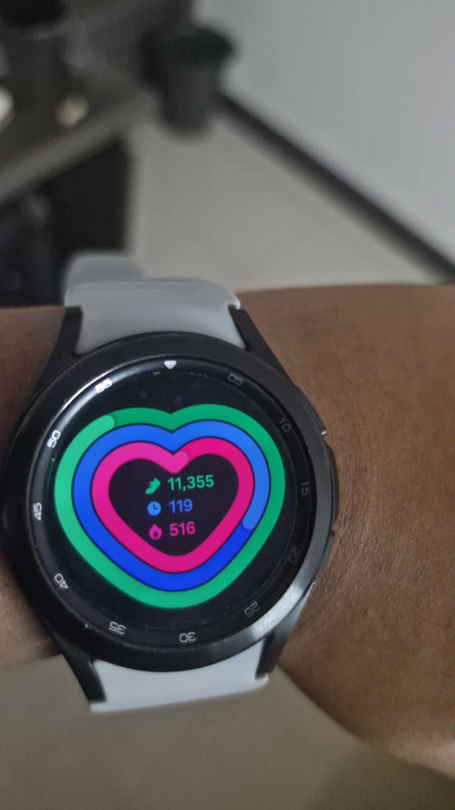 Nisha's smartwatch showing 11,355 steps, consistent daily movement was a key part of her plan