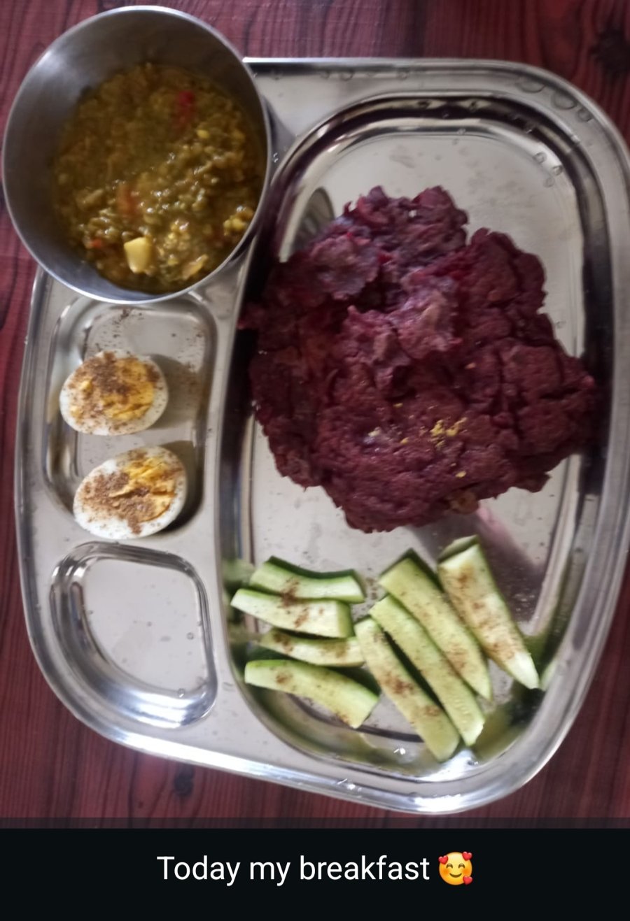 One of my breakfasts: a beetroot adai, boiled eggs, and cucumber