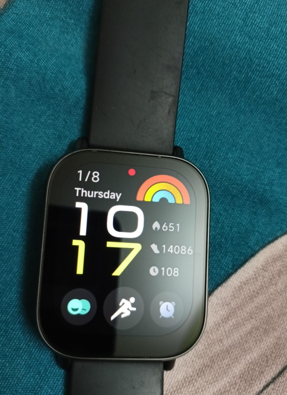 Madhu's smartwatch showing 14,086 steps on a single day