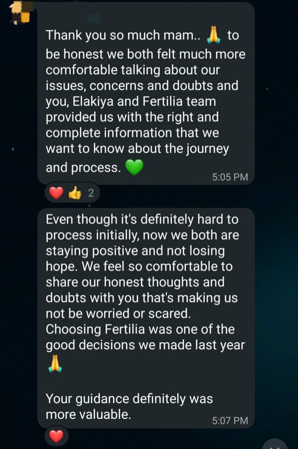 Couple praising Fertilia's supportive environment for discussing fertility concerns