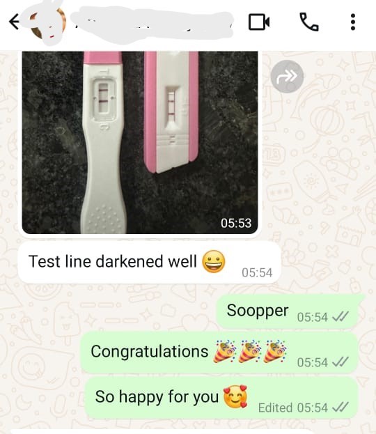 Patient shares pregnancy test with darkened line